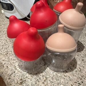 Red and Beige Baby Bottle Set